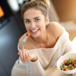 Woman eating a salad