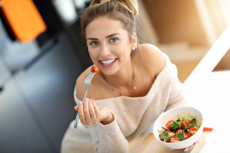 Woman eating a salad