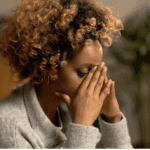 A woman looking stressed.